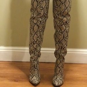 Thigh high snake boots ,